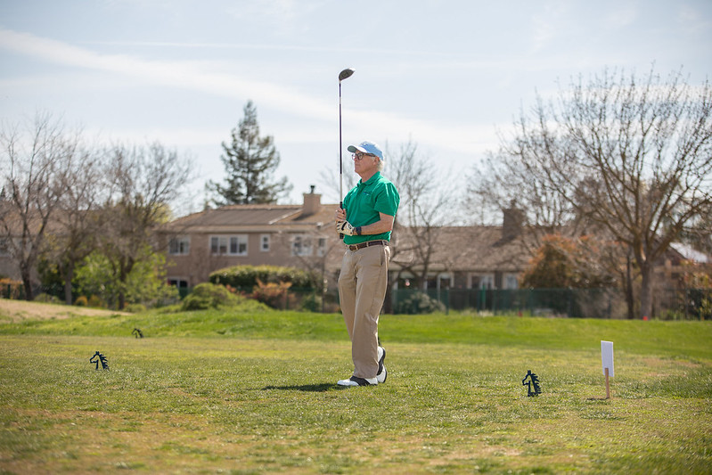 A man on a golf course.