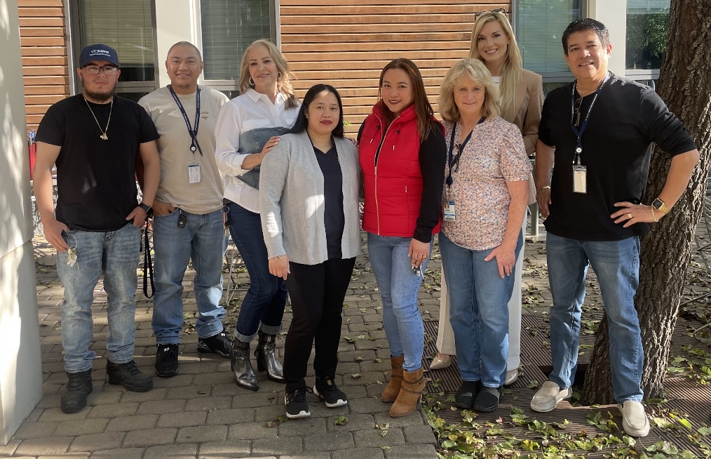 The King Hall custodial staff in the courtyard.