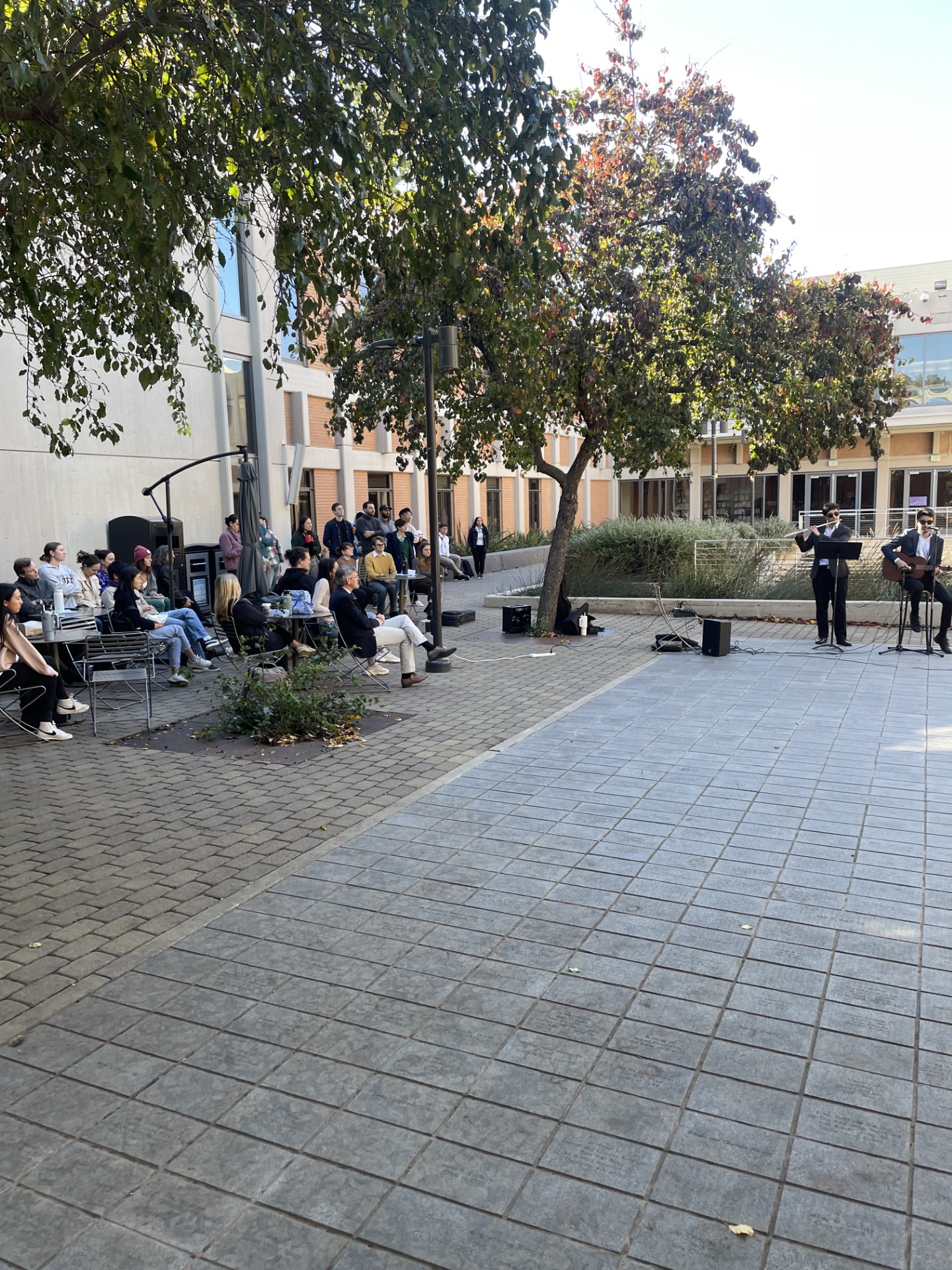 A crowd listening to live music at King Hall.
