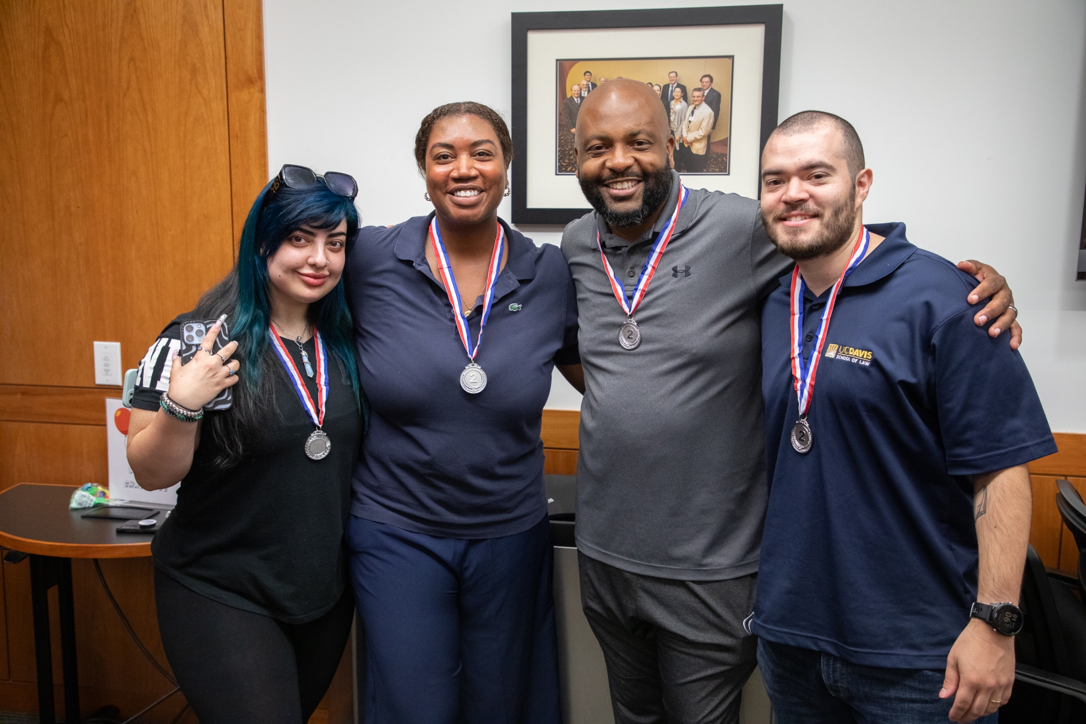 King Hall staff with their Office Olympics medals.
