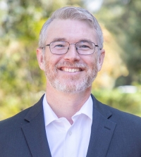 Professor Karrigan Börk smiling at the camera.